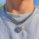 SILVER CHAINED HEART CUBAN LINK